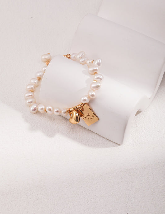 Sterling Silver Pearl Bracelet with Charms
